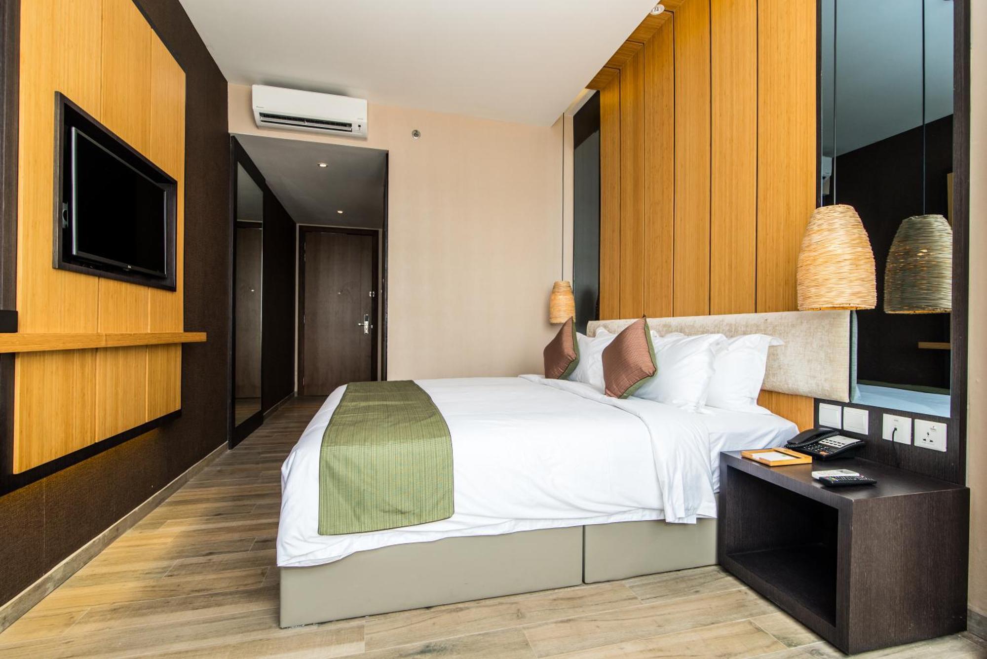 Eska Hotel Batam Quarto foto